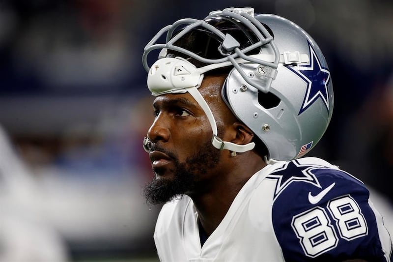 Dallas Cowboys' Dez Bryant warms up before an NFL football game against the Washington...