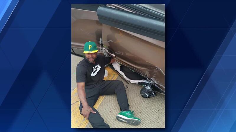 A Pittsburgh man attempting to help a driver escape a rollover car crash held the stranger’s...